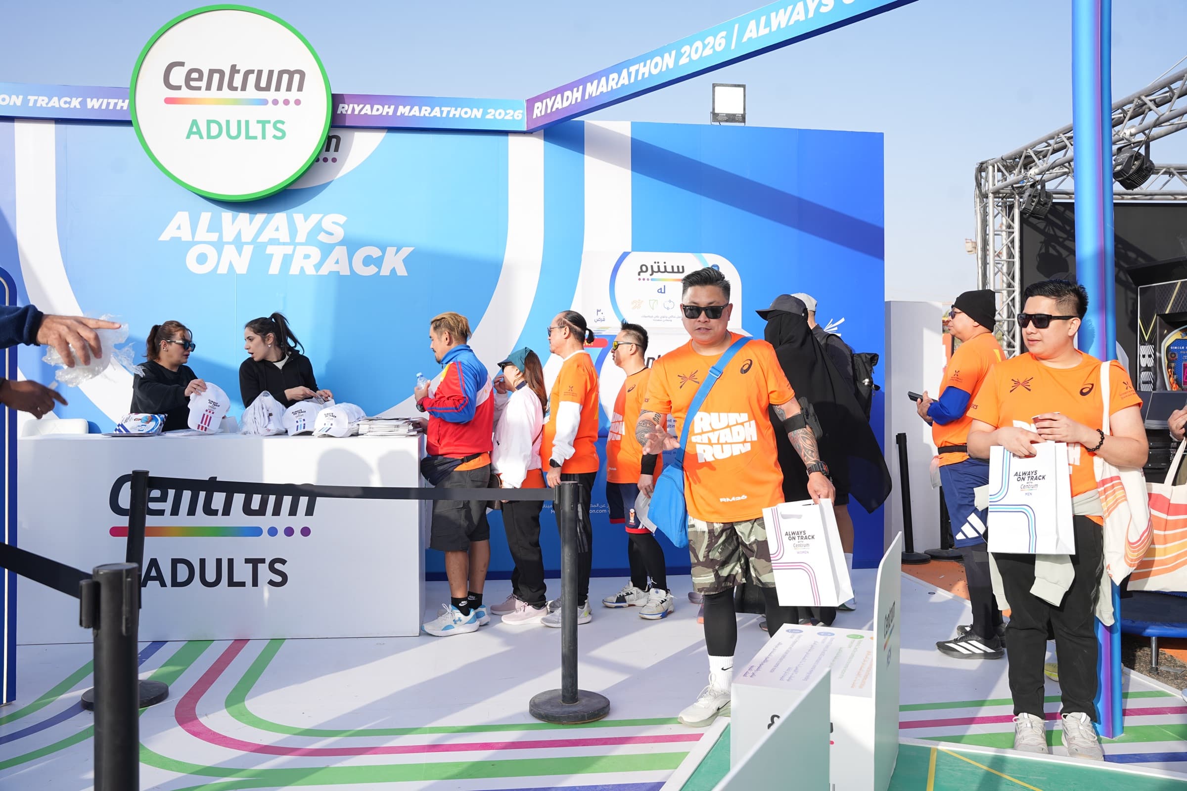 Centrum runners at booth
